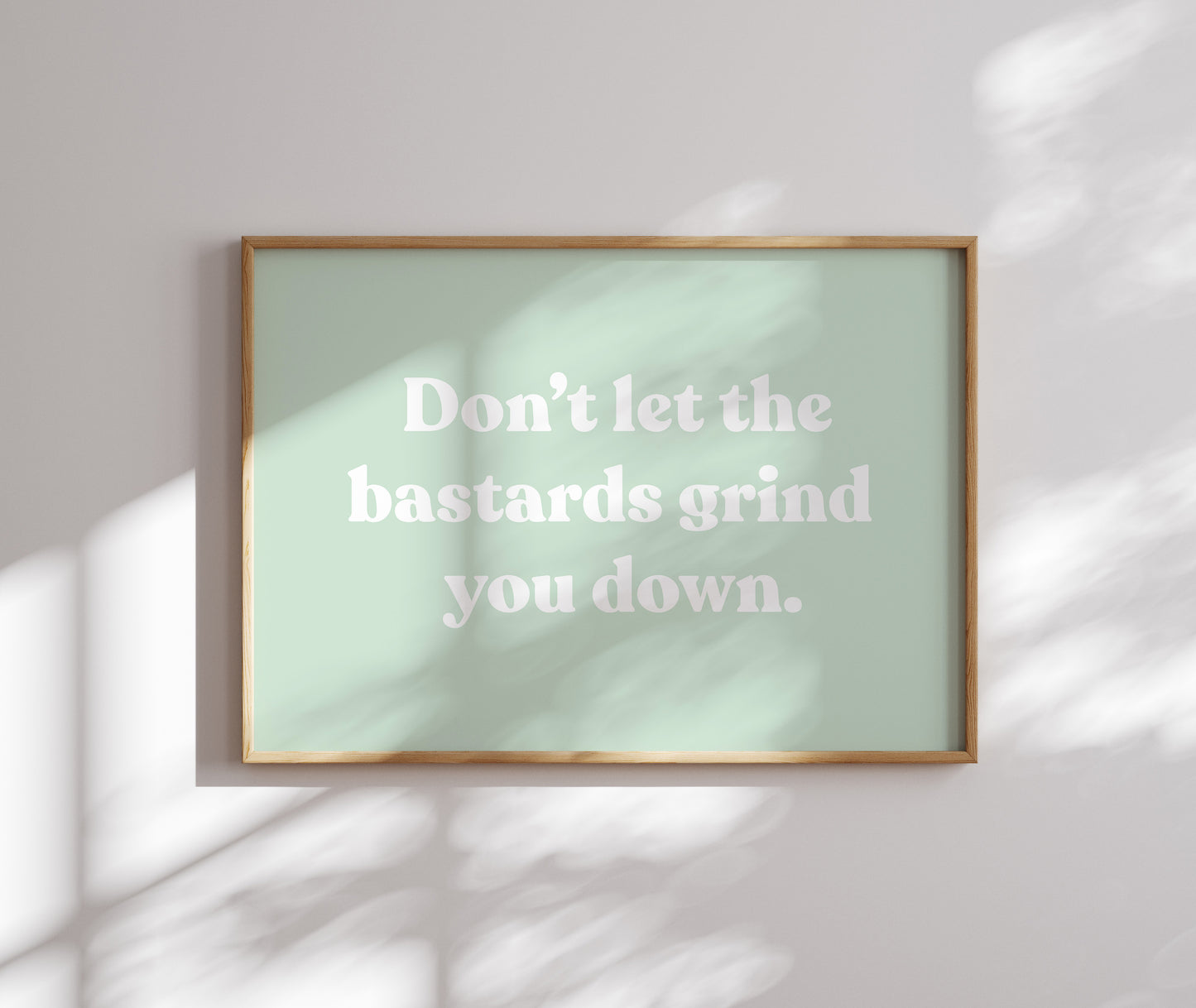 Don't let the bastards grind you down - White on Green - Wall art