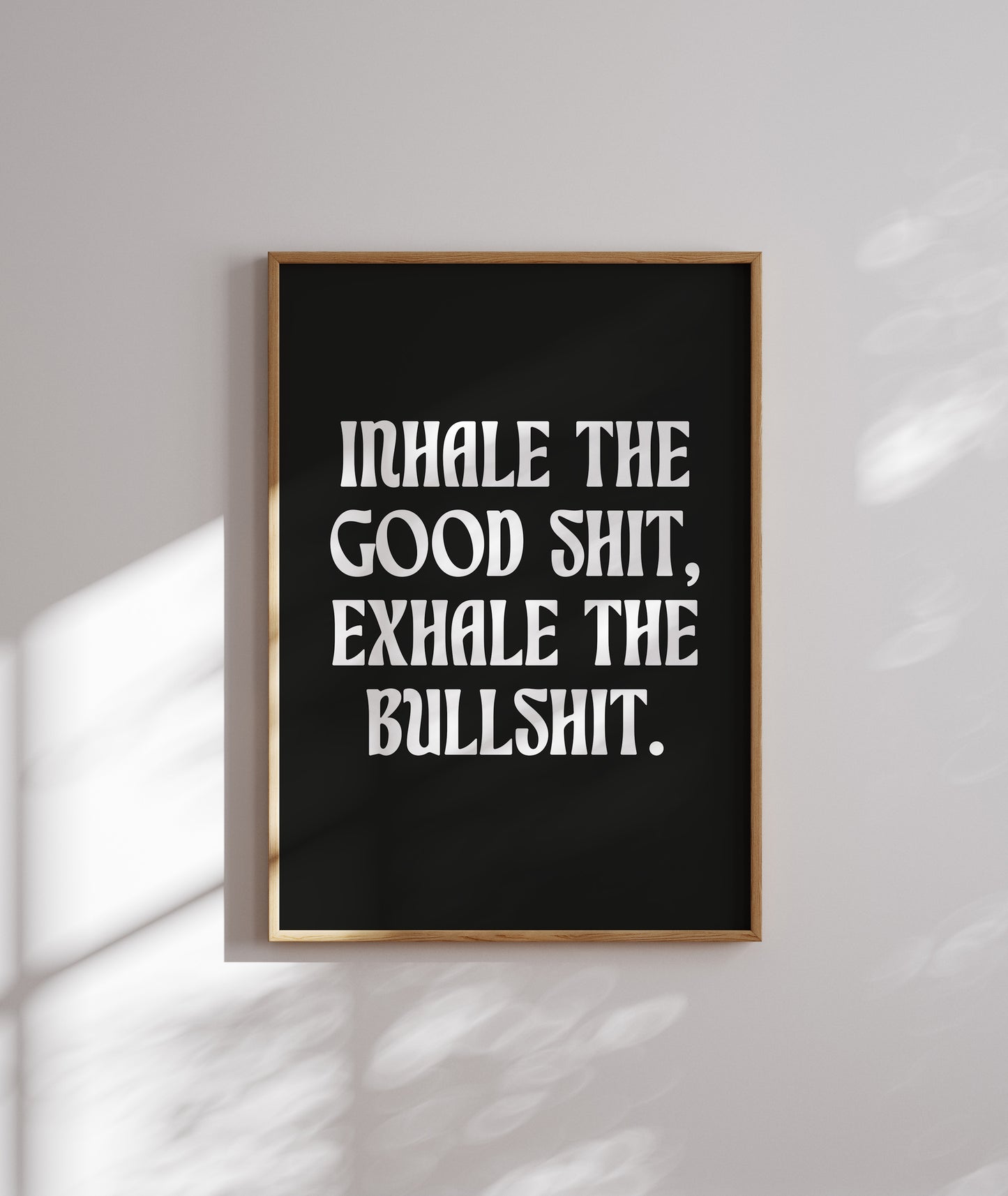 Close-up of 'Inhale the Good Shit, Exhale the Bullshit' poster printed on high-quality matte paper.
