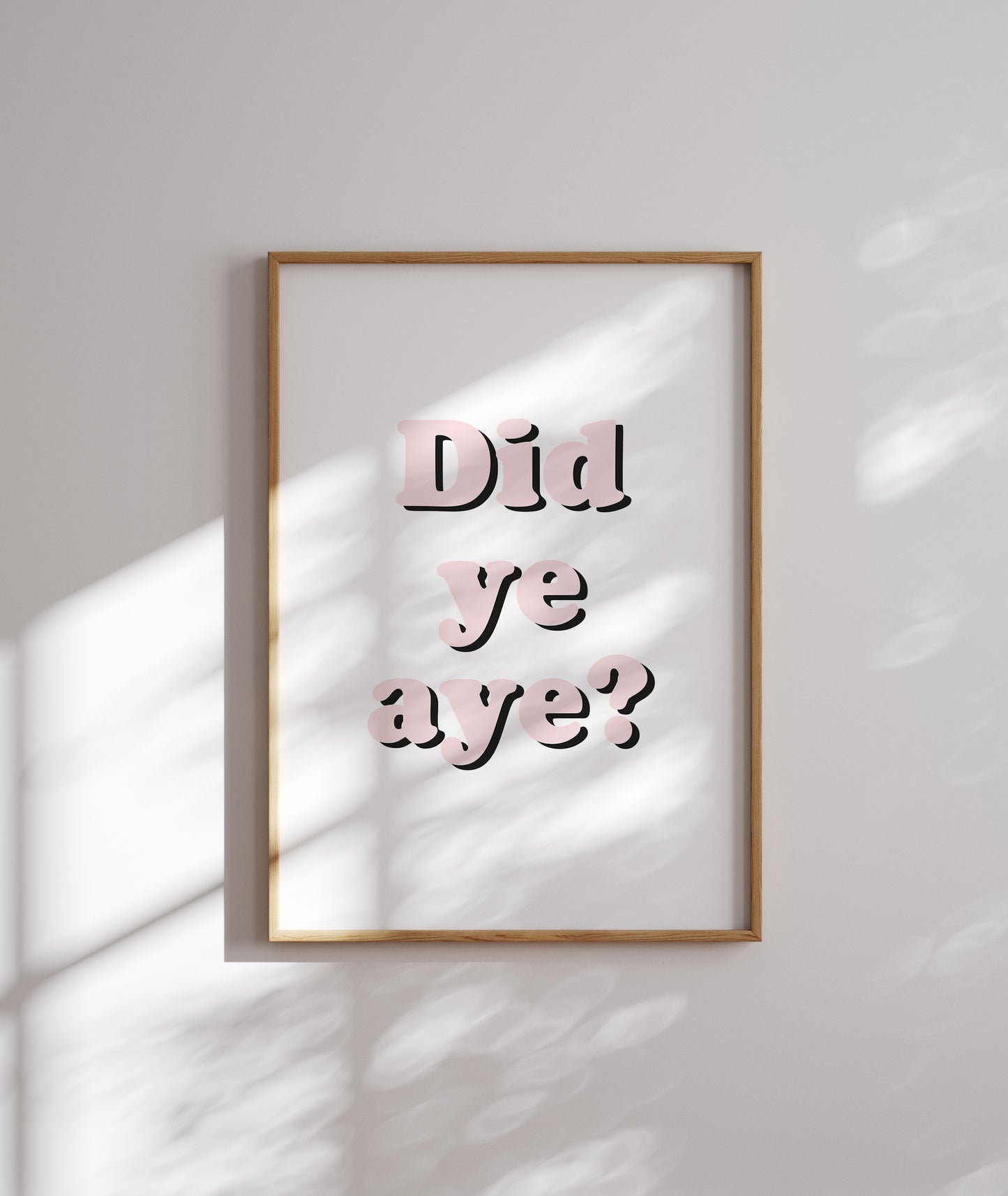 Framed 'Did ye aye?' motivational wall art hanging in modern décor.